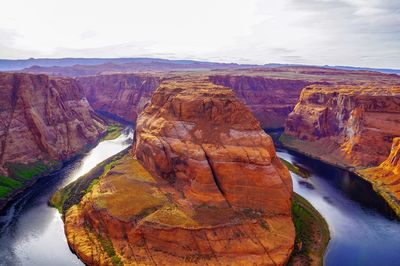 Aerial view of rock formations against sky