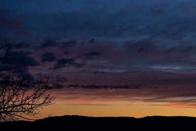 Scenic view of dramatic sky during sunset