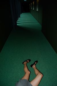 Low section of woman standing on floor