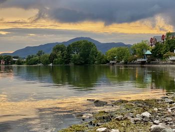 Scenic view of lake against sky during sunset