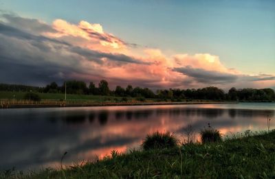 Scenic view of lake against sky during sunset