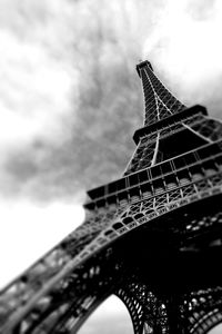 Low angle view of building against cloudy sky