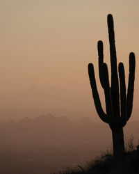 Scenic view of mountains against sky during sunset