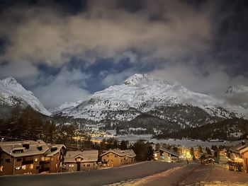 Snow covered mountains against sky during winter