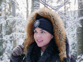 Portrait of young woman in winter