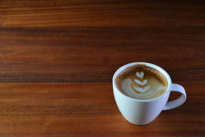 Coffee cup on table