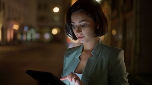 Young woman using mobile phone