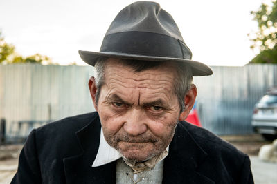 Portrait of man wearing hat