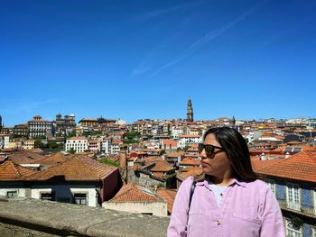 High angle view of townscape against blue sky
