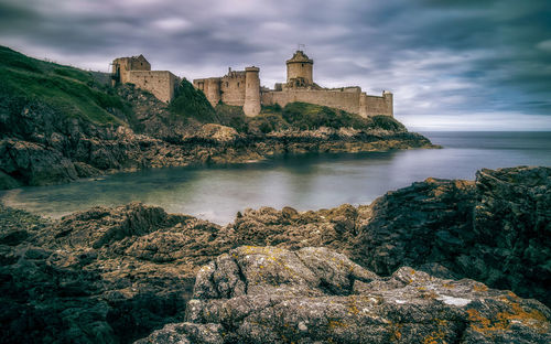 View of fort against cloudy sky