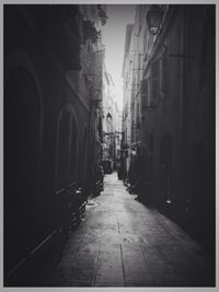 Narrow alley in front of building