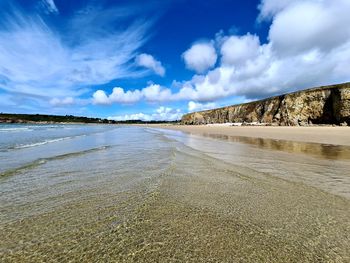 Scenic view of beach against sky