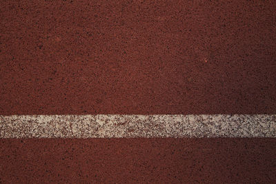 High angle view of paint on running track