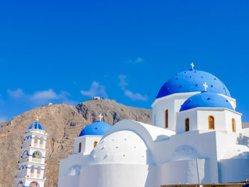 White building against blue sky