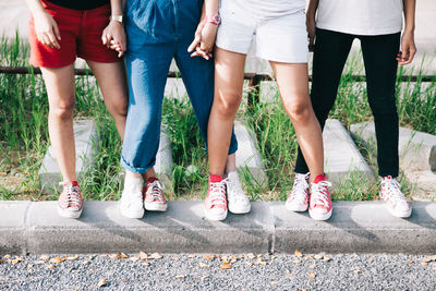 Low section of women standing outdoors