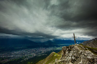 Scenic view of landscape against cloudy sky