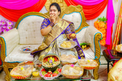 Midsection of woman holding food