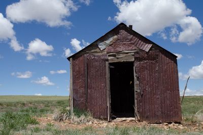 Built structure against cloudy sky