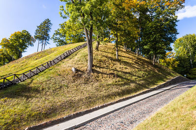 Wooden stairs going up to the historical mound of veliuona, lithuania