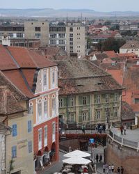 High angle view of street amidst buildings in town