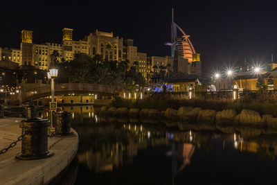 Illuminated buildings in city at night