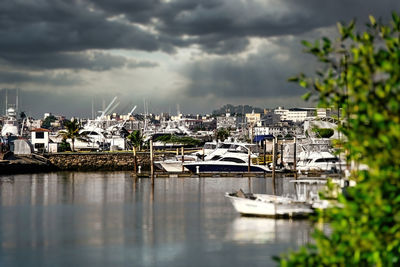 Boats in sea against sky