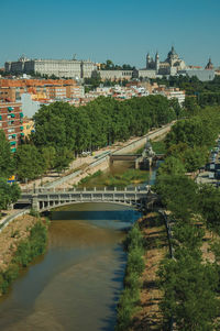 Landscape with the royal palace, almudena cathedral and manzanares river, in madrid, spain.