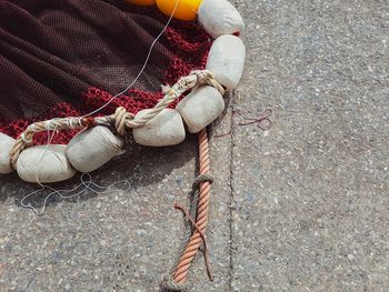 High angle view of fishing net on street