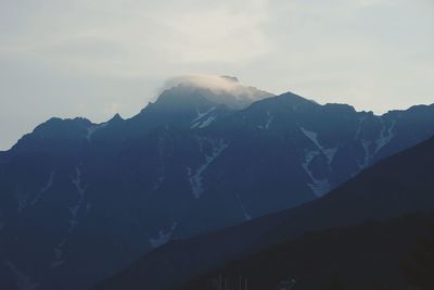 Scenic view of mountains against sky