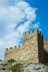 Low angle view of historic building against sky