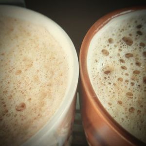 Close-up of cappuccino on table