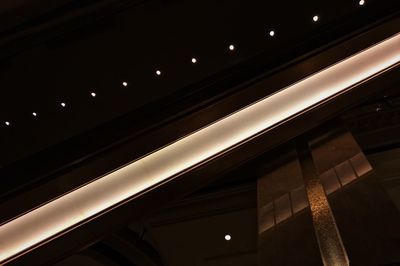 Low angle view of illuminated ceiling