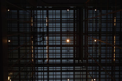 Low angle view of illuminated building at night