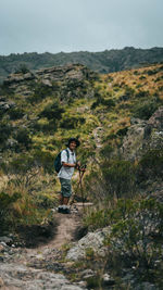 Man doing hike in an arid landscape