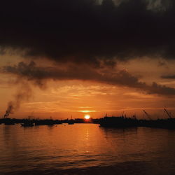 Scenic view of sea at sunset