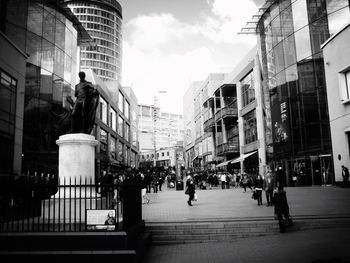 Silhouette of woman in city