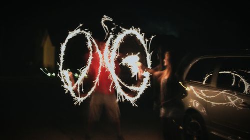 Close-up of firework display at night