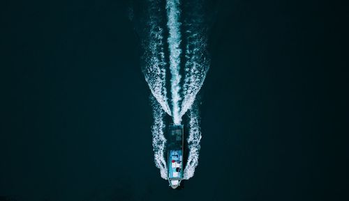 High angle view of ship sailing in lake