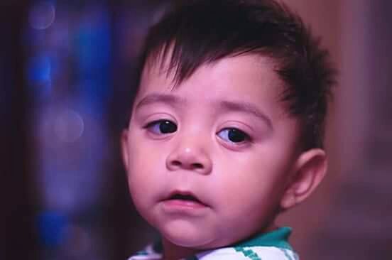 CLOSE-UP PORTRAIT OF BABY BOY