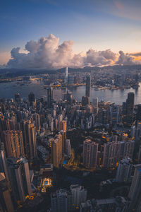 Aerial view of city buildings against sky