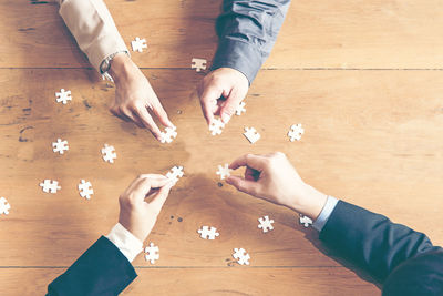 High angle view of people on table