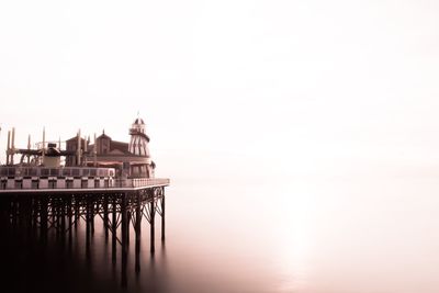 Scenic view of calm sea against clear sky