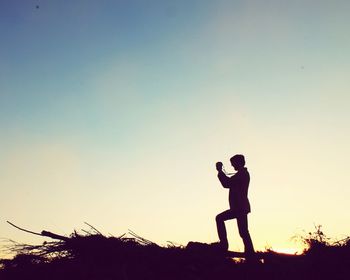 Woman looking at sunset