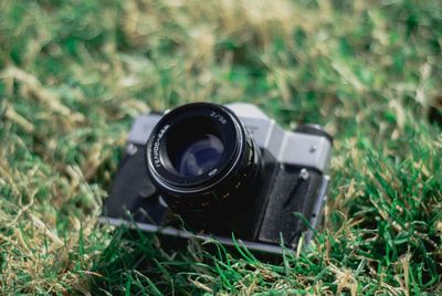 Close-up of camera on field