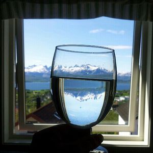 Reflection of clouds in glass window