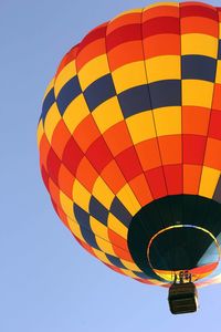 Low angle view of hot air balloon against clear sky