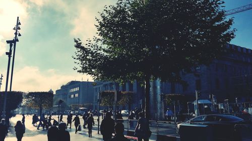 City street against cloudy sky