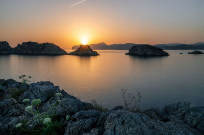 Scenic view of sea against sky during sunset