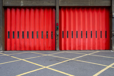 Red closed door of building