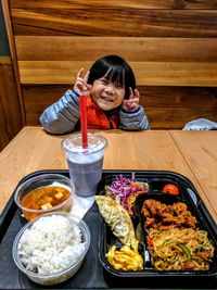 Portrait of a girl holding food